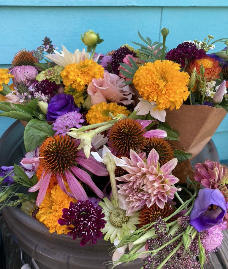 Flower bouquets in a bucket